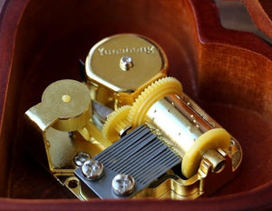 mécanisme musical en or
